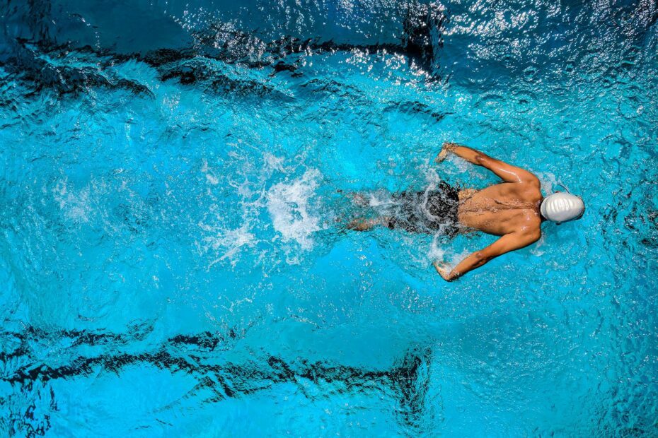 Artistic shot of a competing swimmer taken from above